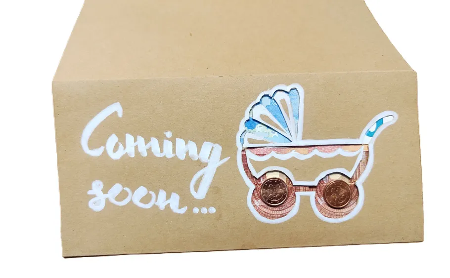 Cardboard box with baby carriage design.