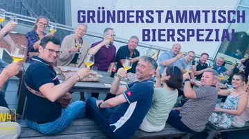 Group of people toasting with beer outdoors.