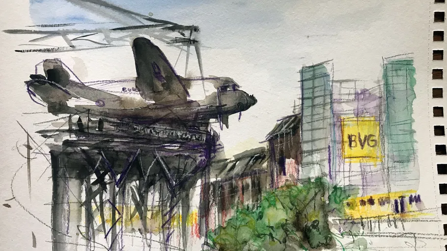 Plane displayed on structure in urban setting.