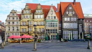 Historic buildings in a city square.