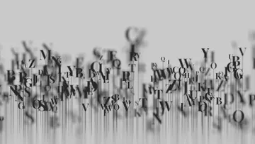 Schwebende Buchstaben mit verschwommenem Bewegungseffekt.