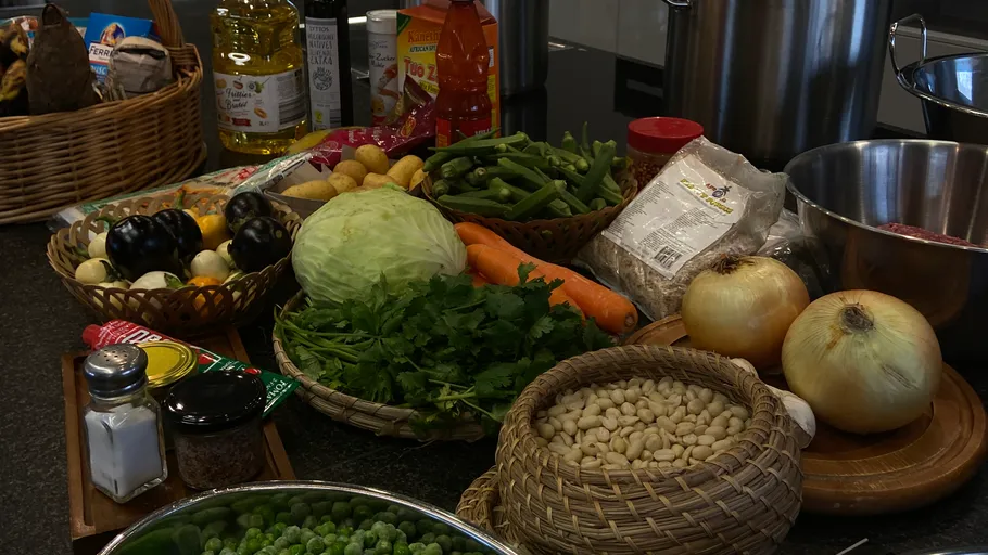 Assorted vegetables on kitchen counter.