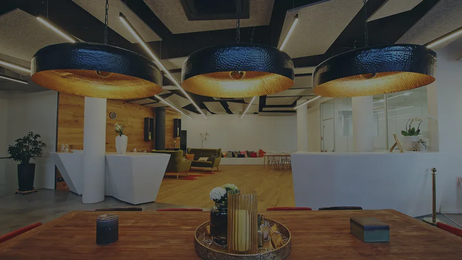 Modern office lounge with stylish lighting.