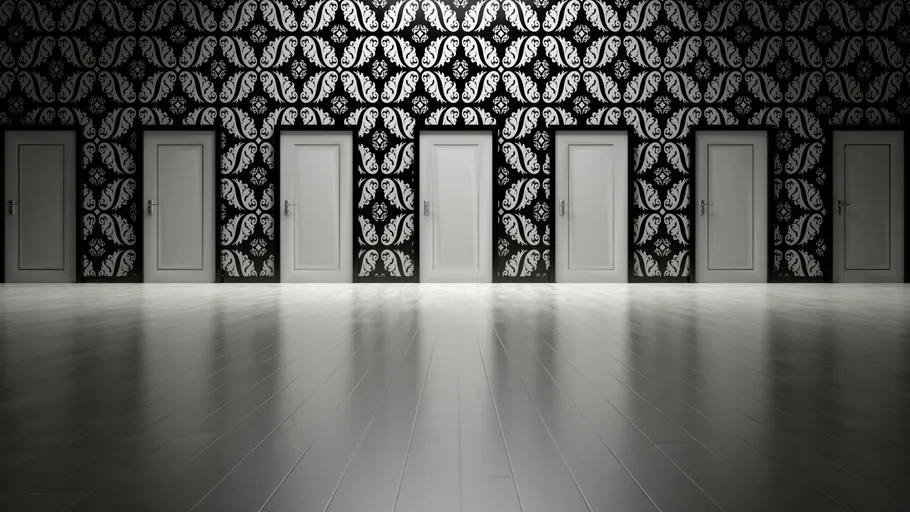 Six white doors, patterned wallpaper background.