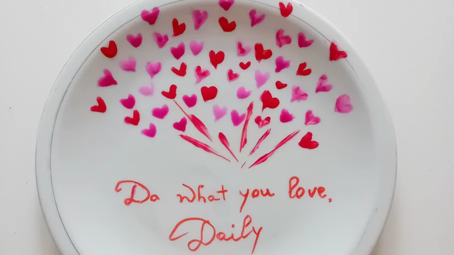Plate with heart designs and motivating quote.