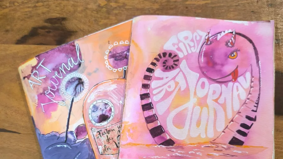 Colorful art journals with creative designs.