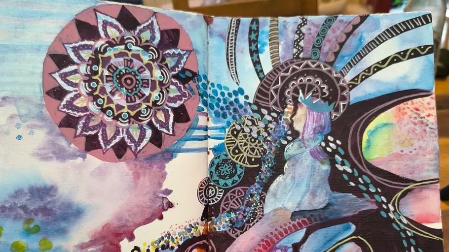 Colorful abstract painting with geometric patterns.