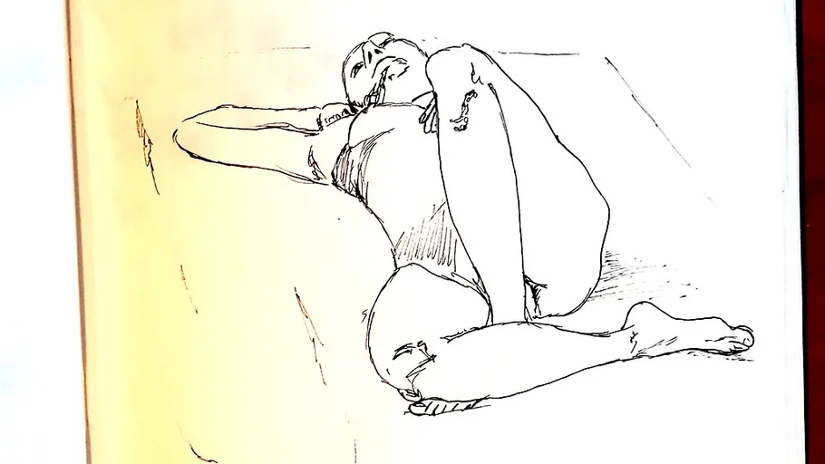 Sketch of person reclining on the ground.