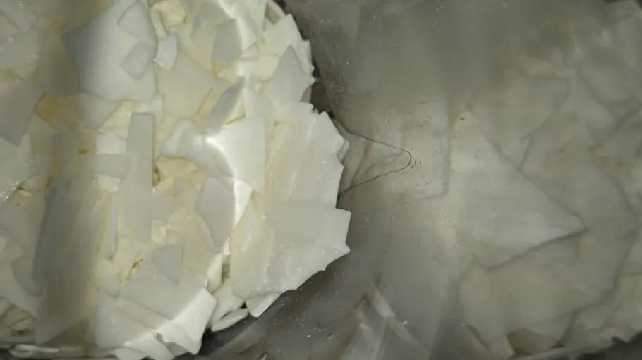 Closed-up view of white wax flakes.
