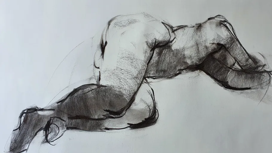 Charcoal sketch of reclining human figure.