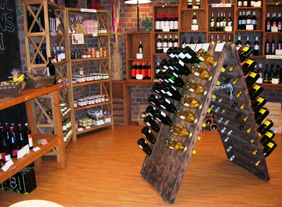 Wine shop interior with bottles and shelves.