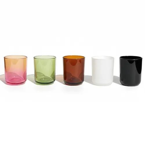 Colorful glass cups lined up on a white background.