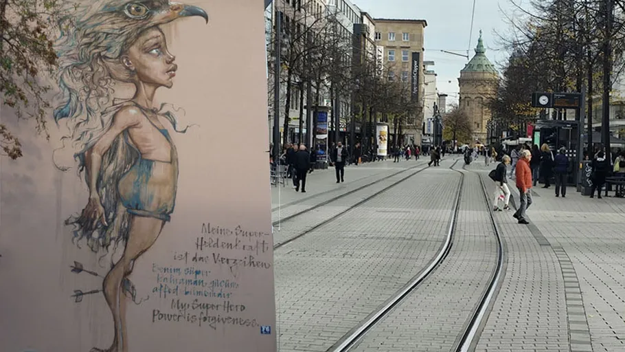 Wall mural and people on city street.