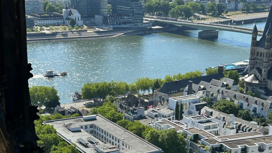 Cityscape with river and bridge view.