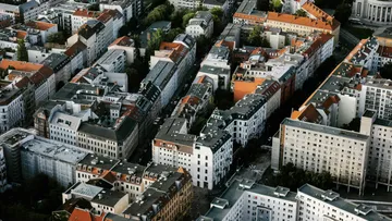 Aerial view of compact city buildings.
