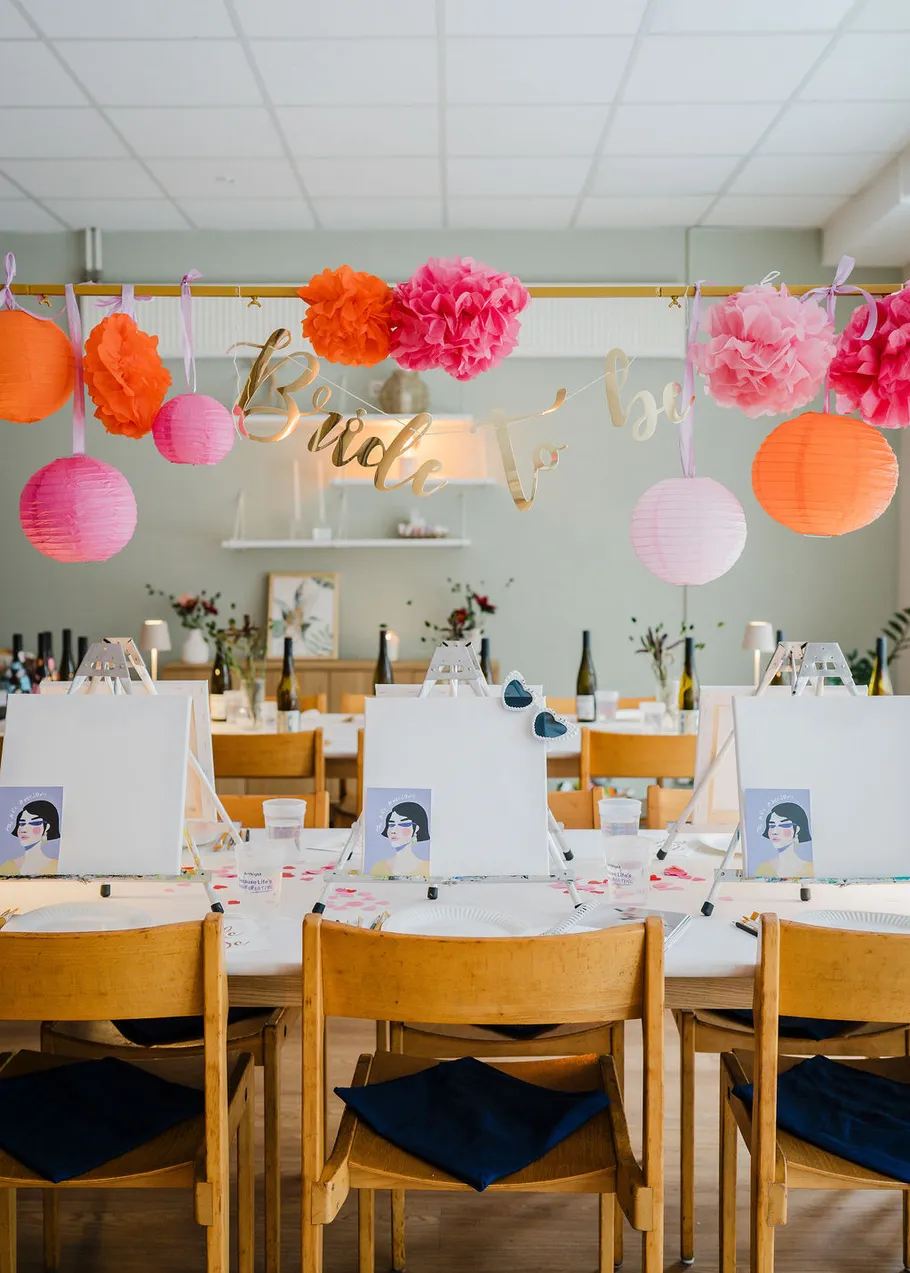 Art station with colorful decorations, bridal theme.