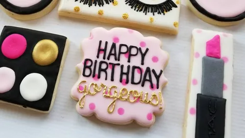 Decorative cookies with birthday message and makeup theme.