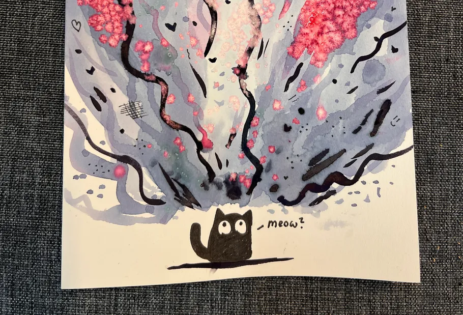 Black cat painting under blossoming branches.