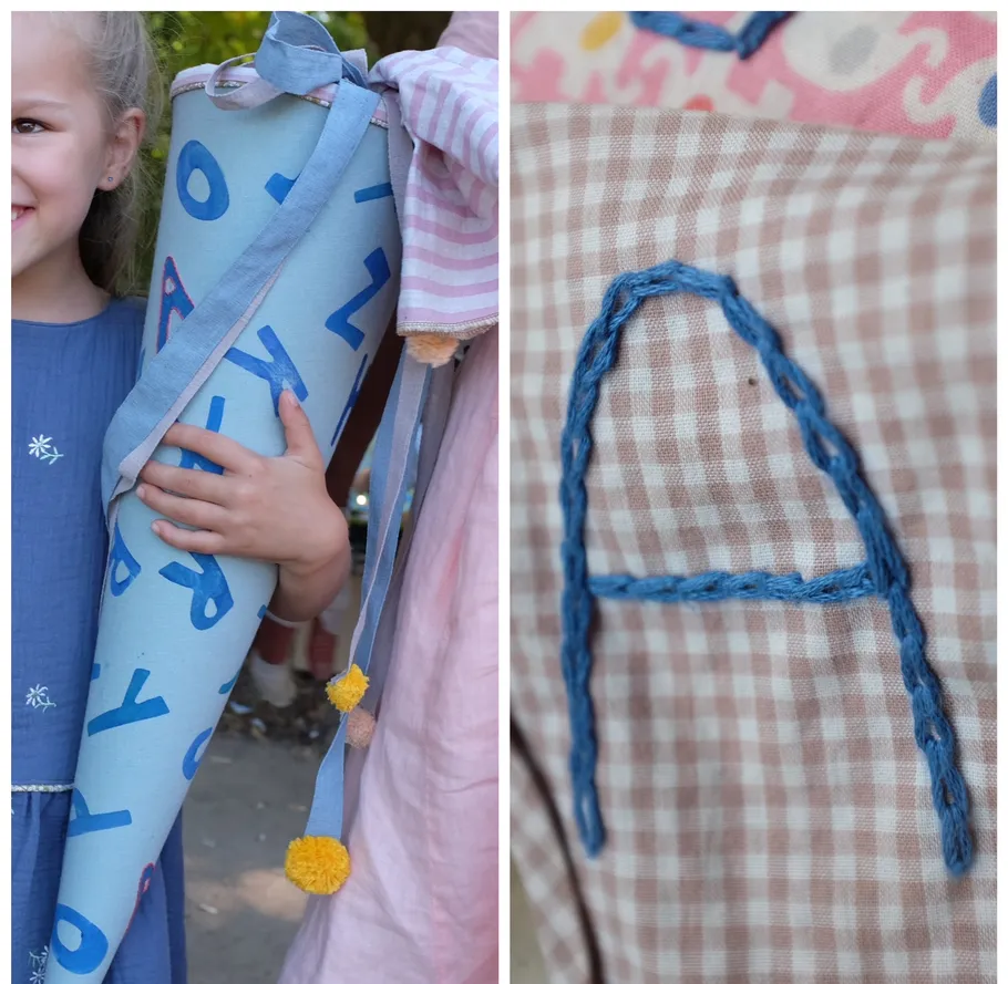 Child holding decorated cone; close-up of letter A.
