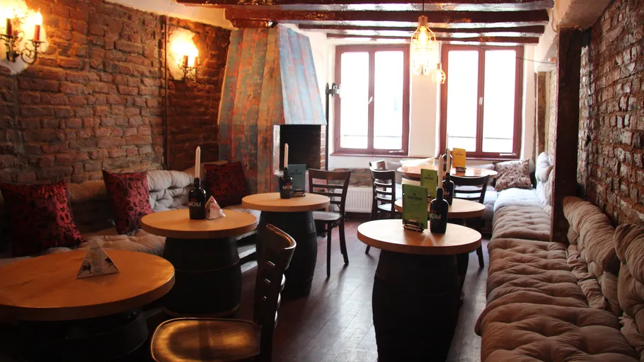 Cozy cafe interior with brick walls.