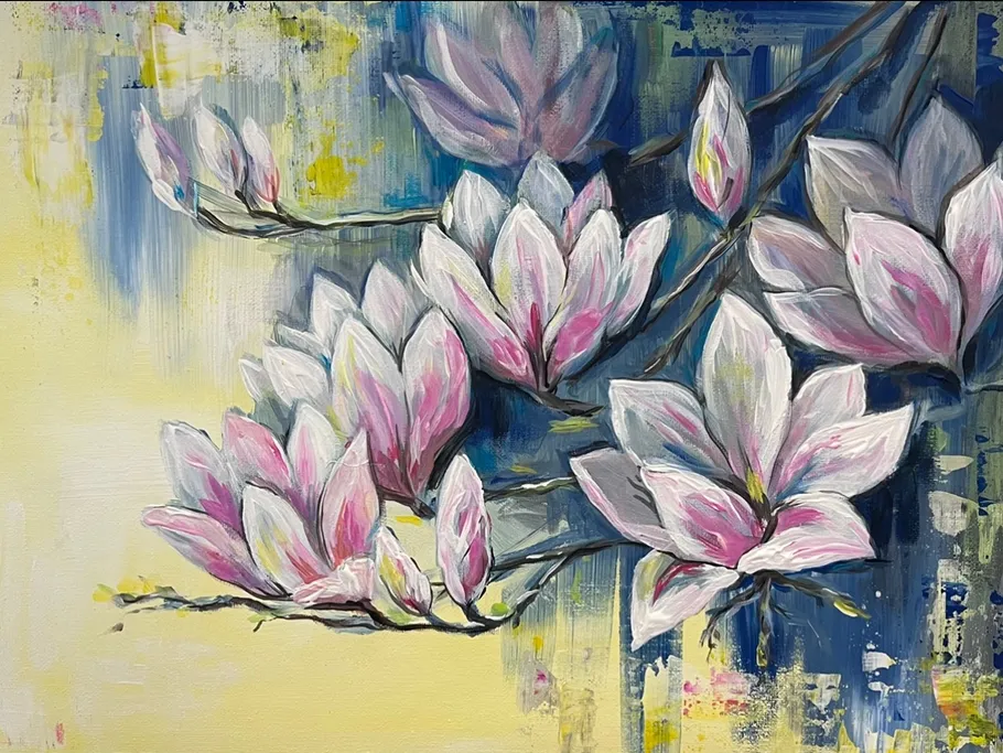 Magnolia blossoms unfold against a colorful background.