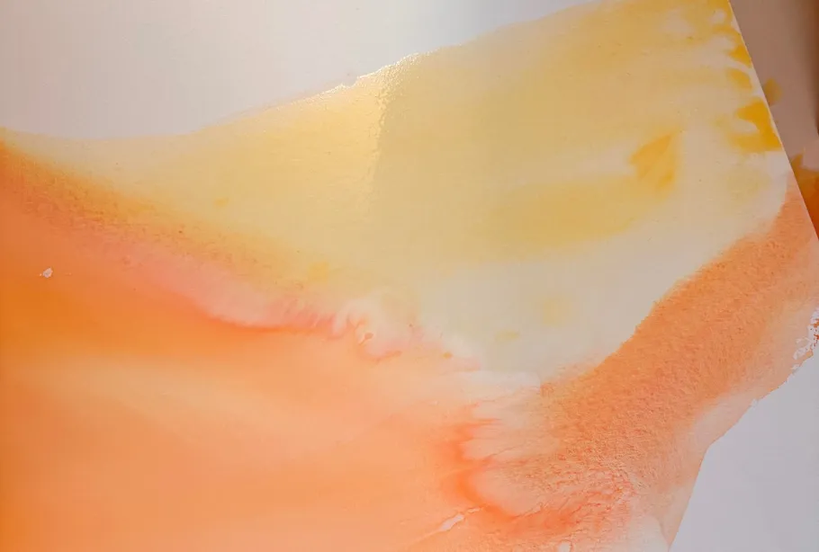 Abstract orange and yellow watercolor painting.