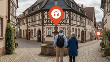 Couple walking in quaint European village.