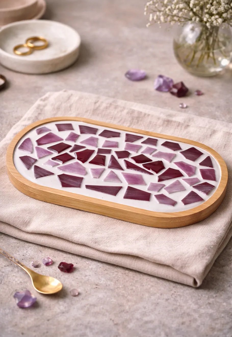 Mosaic tray on folded cloth, decorative setting.