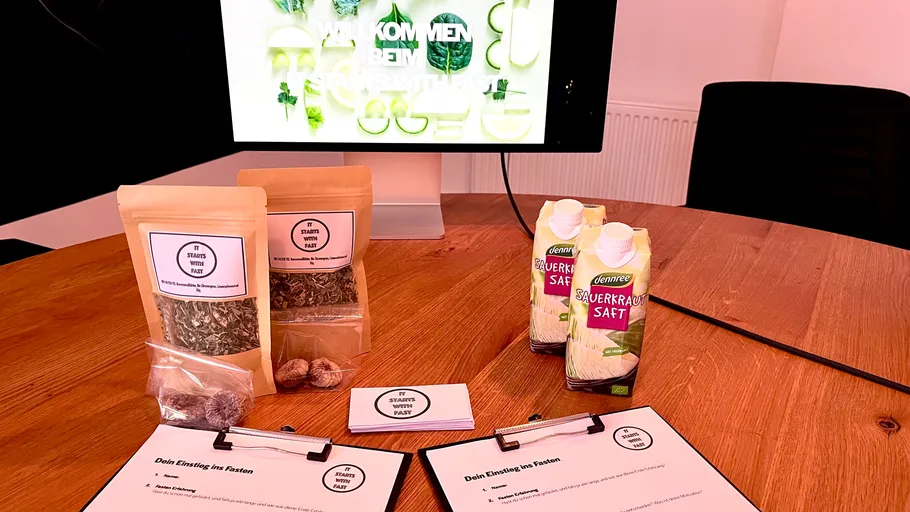 Table with nutritional products and clipboard forms.