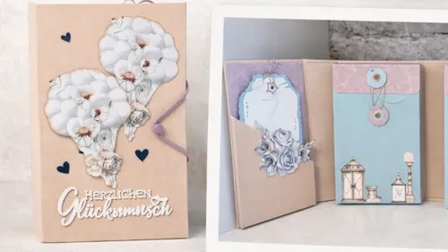 Decorative book with floral and card designs.