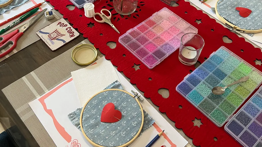 Crafting materials arranged on a table.