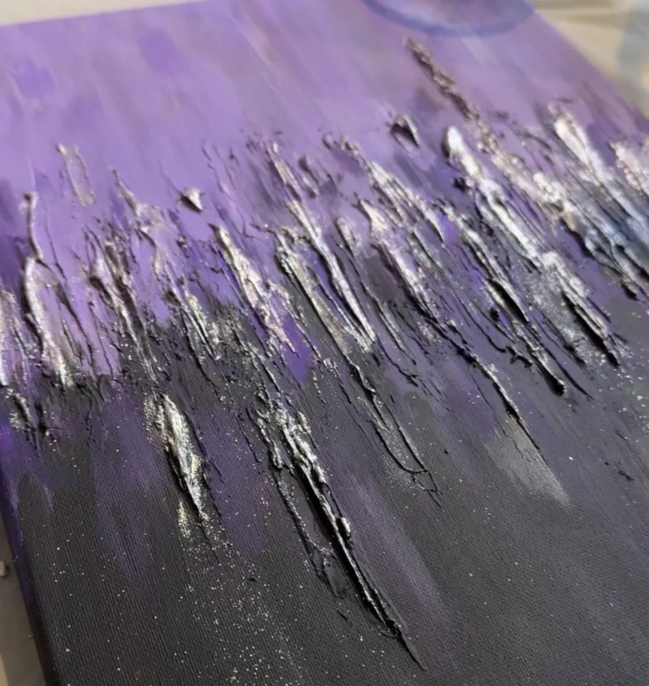 Textured abstract painting with purple and black hues.