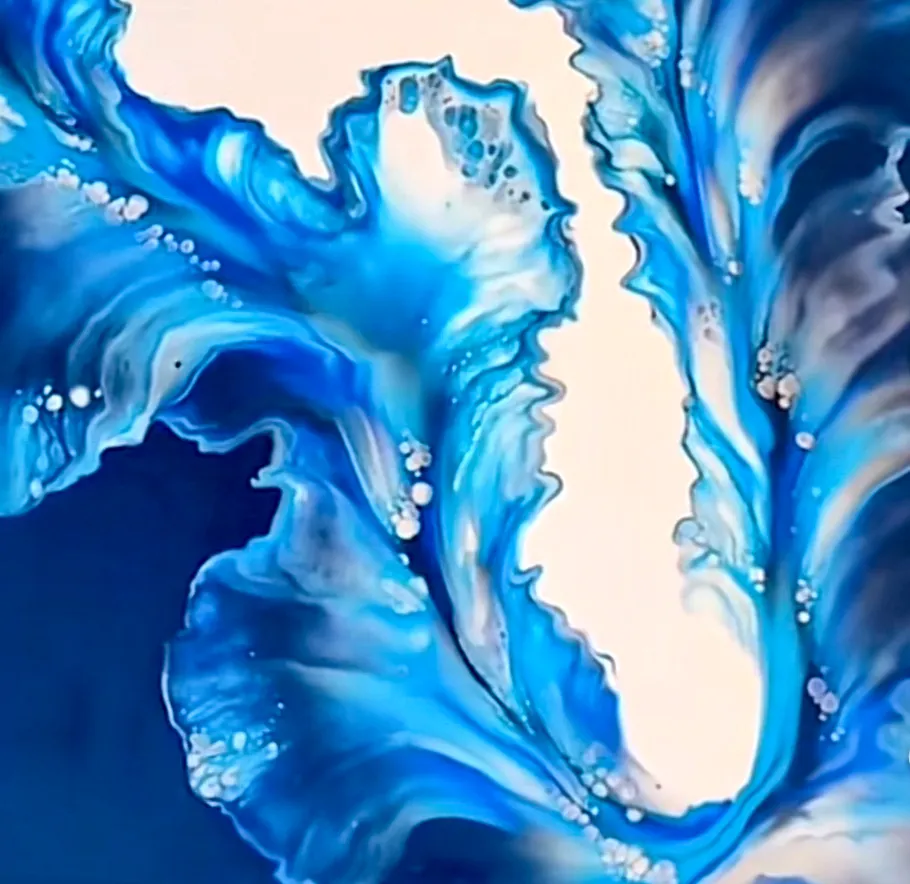 Abstract blue swirling patterns on white background.