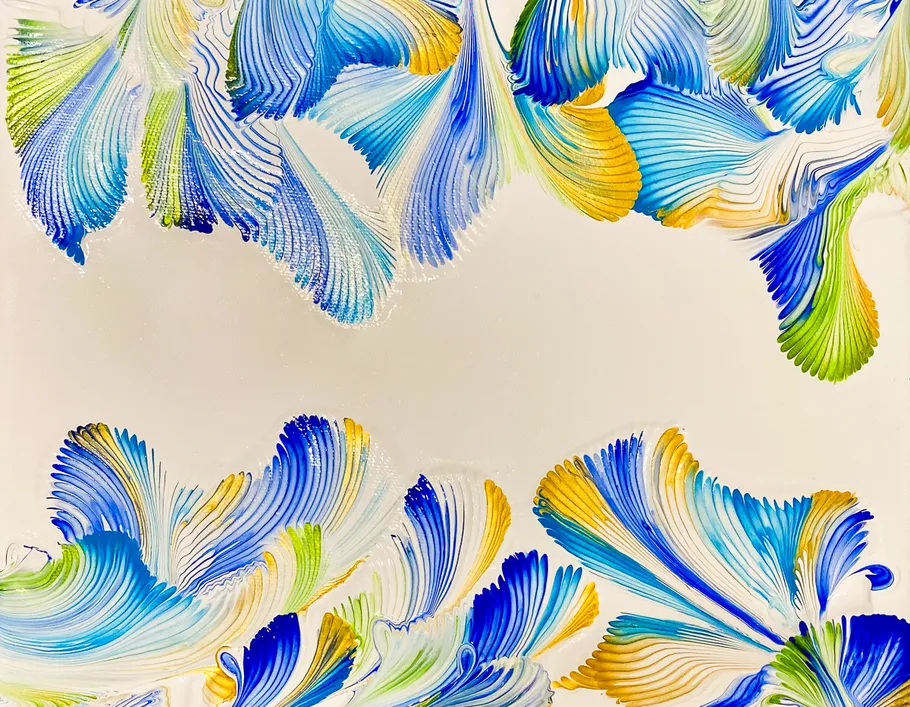 Colorful abstract brushstroke pattern on canvas.