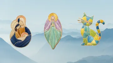 Colorful embroidery patches on mountain backdrop.