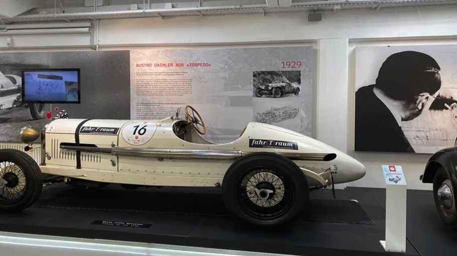 Classic car displayed in a museum setting.