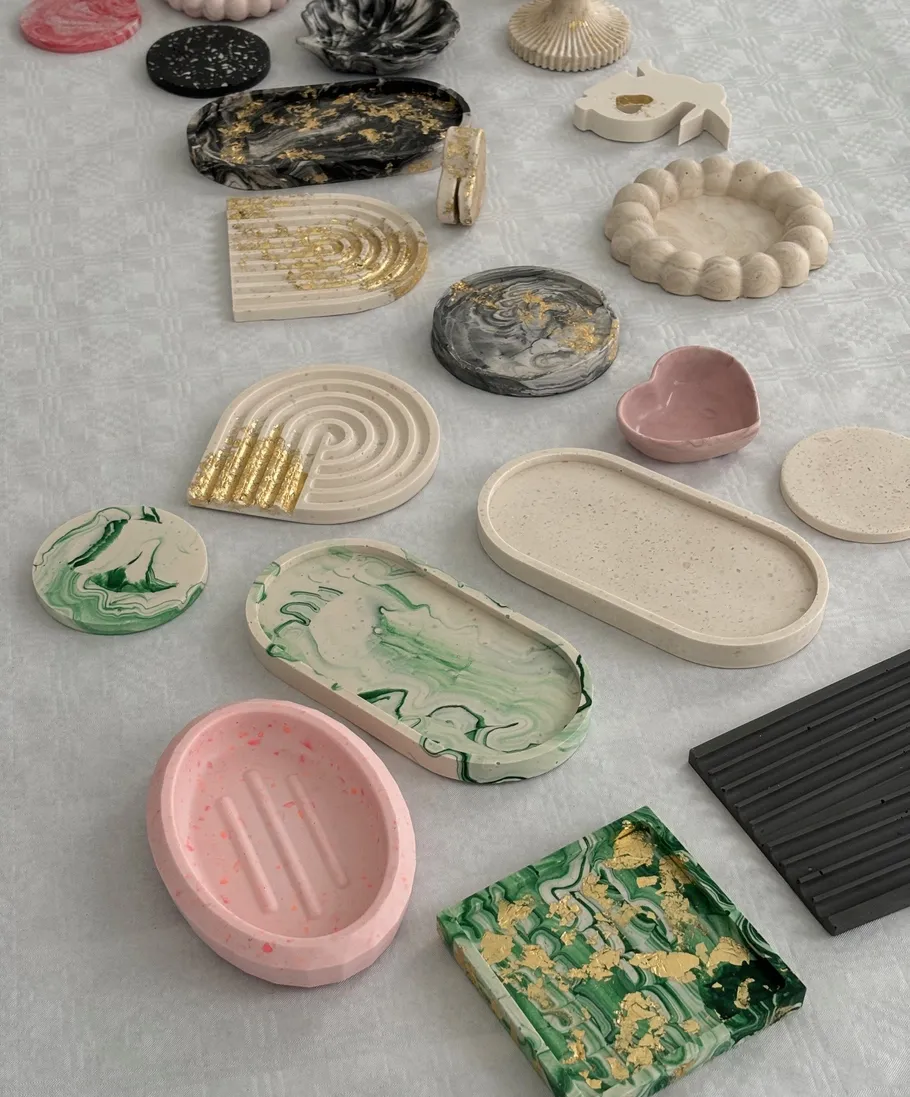 Colorful clay dishes arranged on a table.