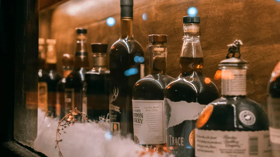 Bottles of liquor displayed on a shelf.