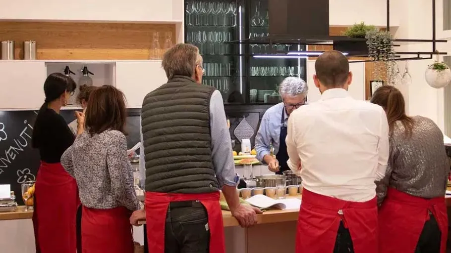 Group cooking class in a modern kitchen.