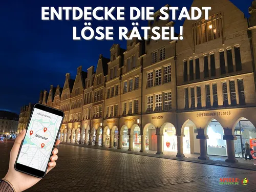 Hand hält Handy; historische Gebäude im Hintergrund.