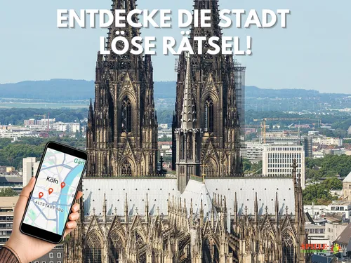 Hand holds phone map, Cologne Cathedral background.