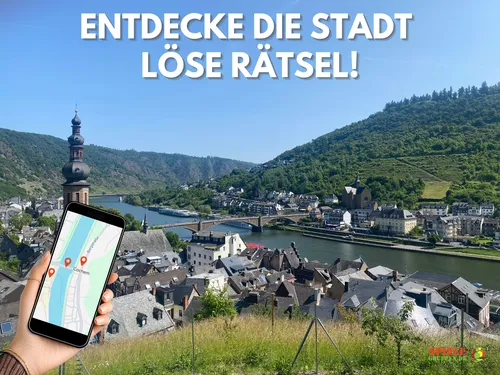 Hand holding phone, map in picturesque city.