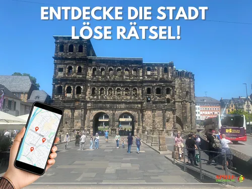 Hand holds phone with map in ancient city.