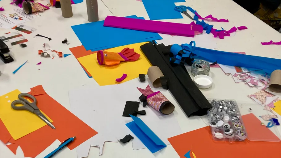 Craft supplies scattered on a table.
