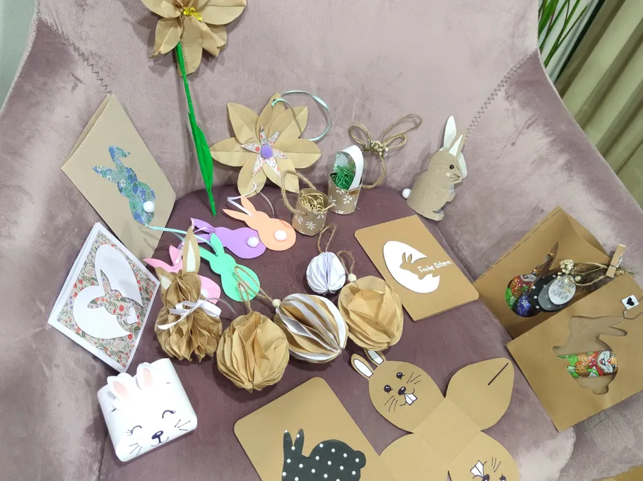 Handmade crafts with bunny and paper decorations.