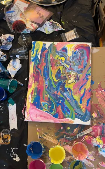Abstract painting with colorful swirl design.