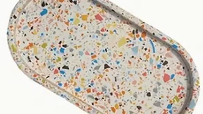 Colorful speckled tray on white background.