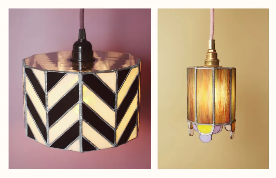 Two stained glass pendant lights, geometric designs.