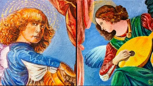 Two painted angels playing musical instruments.