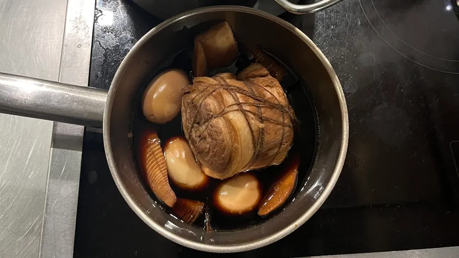 Meat and eggs in soy sauce pot.